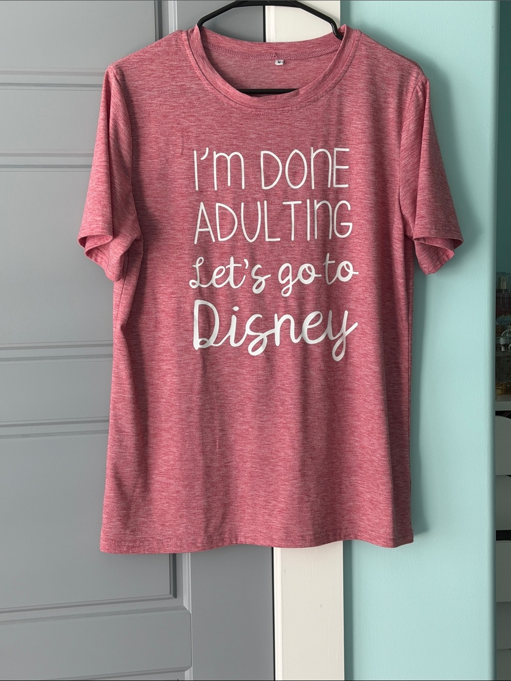 I'm Done Adulting, let’s go to Disney” graphic t-shirt